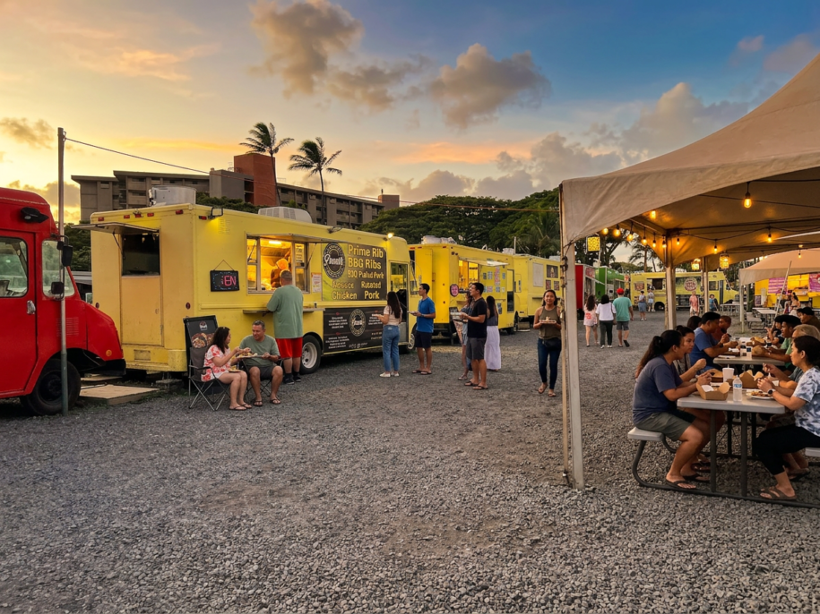 Evening food truck scene at Honoapiilani Food Truck Park